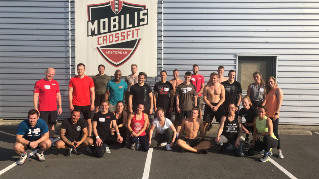 CrossFit Fibonacci - Partner workout: 120 Cal Row / Partner in medball bear  hug 100 Single Arm DB Hang Clean / bear hug 100 Single Arm DB STOH / bear  Hug 100 Burpee GTOH (35/15)