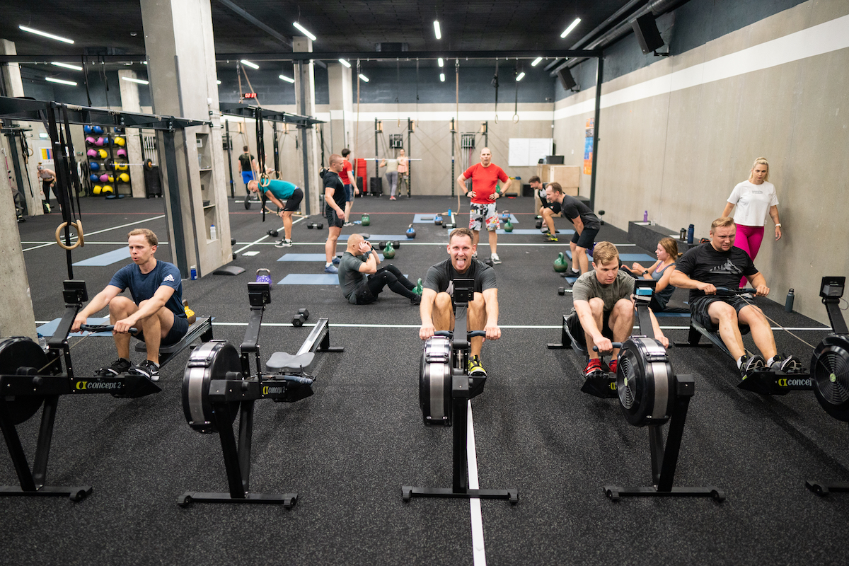 Athletes row in a CrossFit class
