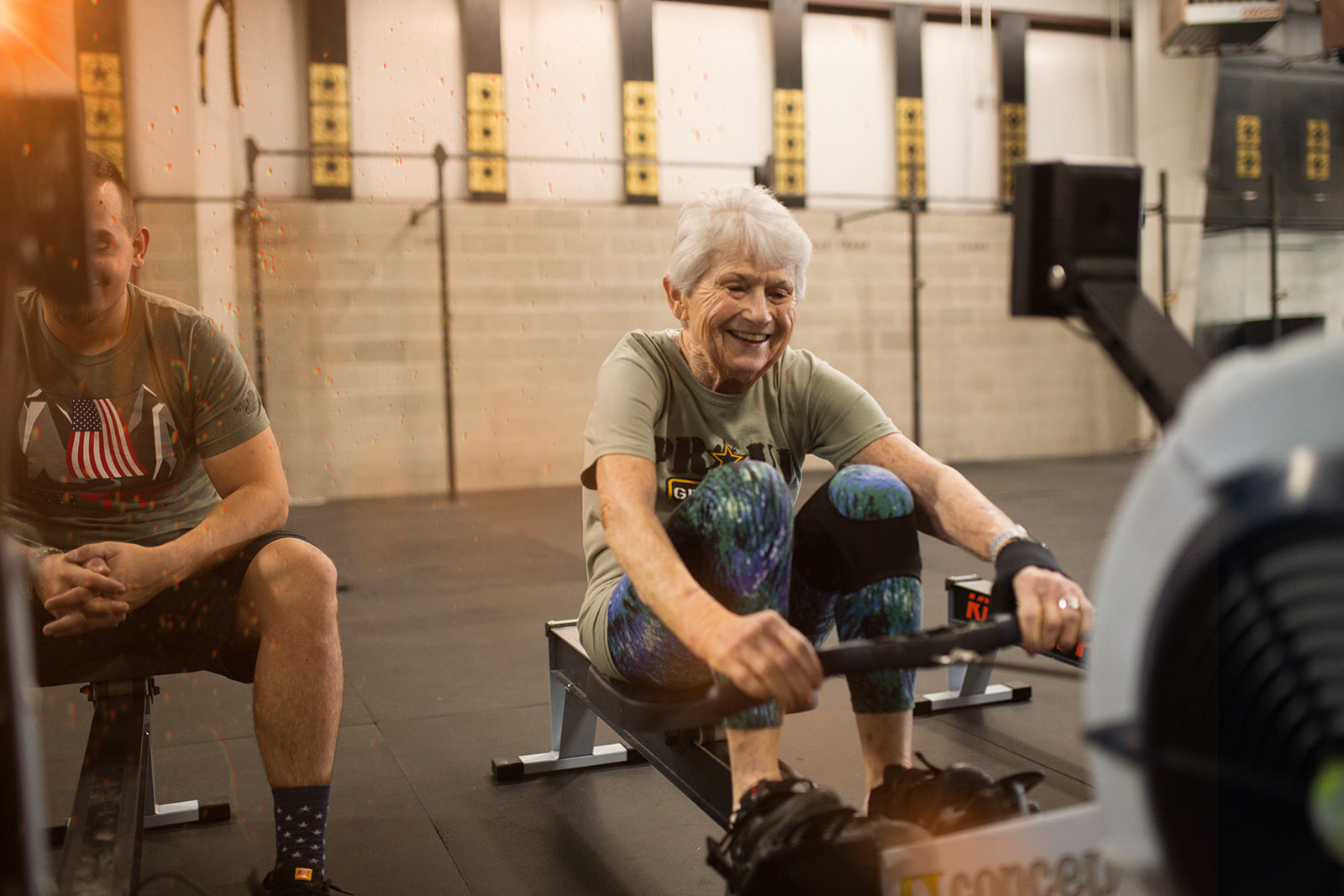 Pat, 80, rows at CrossFit Utah — Photo by Jake Dickerson