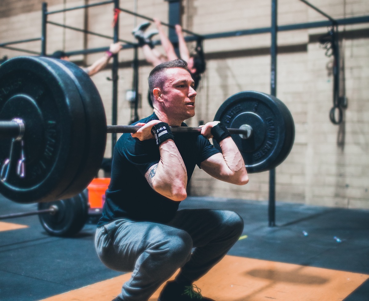 Adam Hawkins in a front squat at CrossFit NHPST