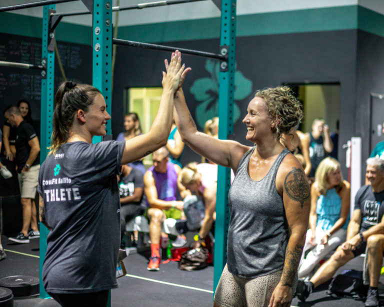 image of CrossFit athletes high fiving