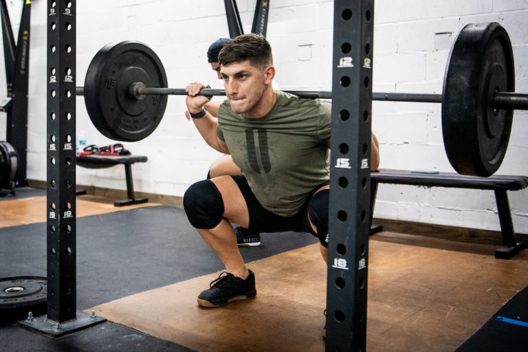 image of a CrossFit athlete at the bottom of a back squat