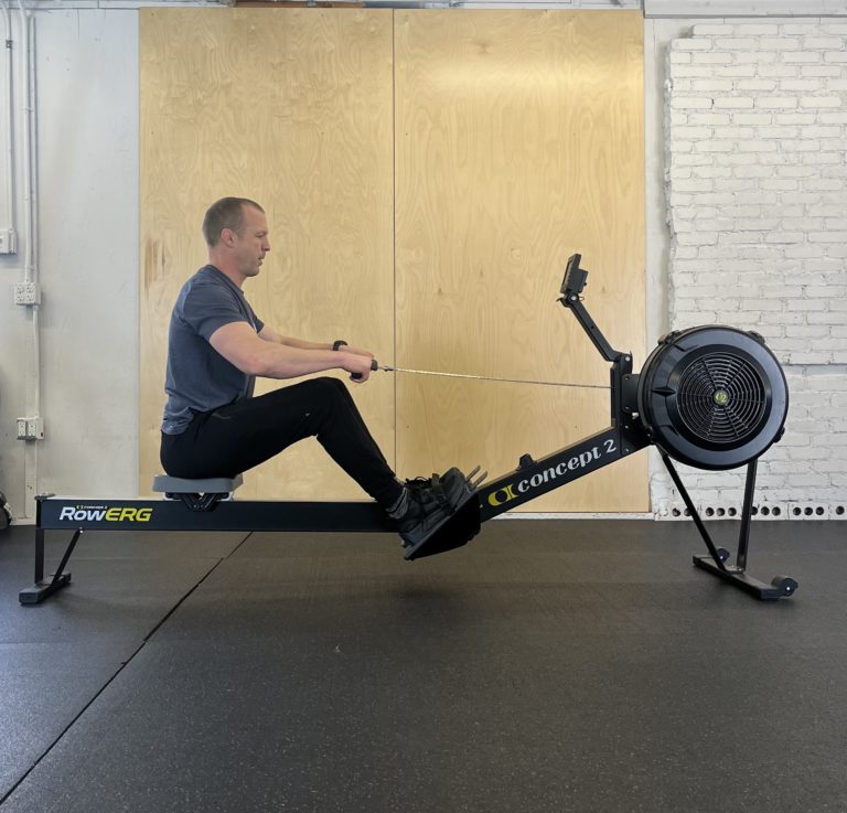 image of CrossFit athlete early pull on the rower