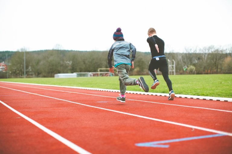 image of athletes sprinting CrossFit
