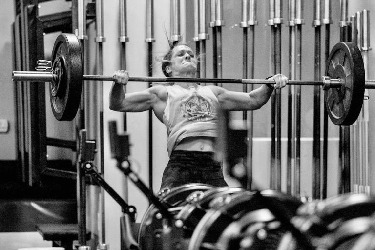 Emily snatching a barbell